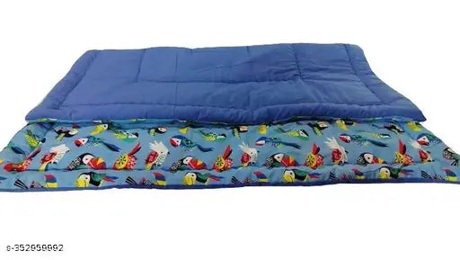 Handmade blue parrot printed cotton baby quilt, soft and warm for mild winter, ideal for year-round use