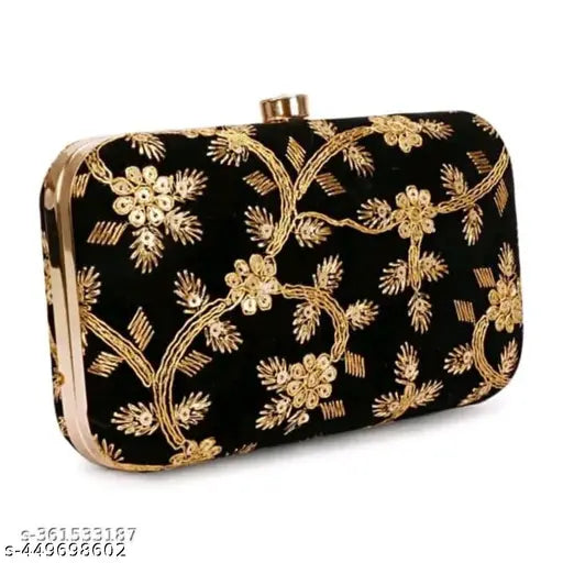 Black embroidered clutch with intricate sky wing design, sleek and compact for evening wear