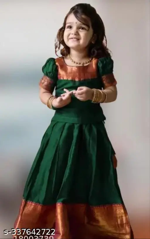 Green taffeta silk flared lehenga choli for girls, colorblocked with short sleeves. Handcrafted ready-made dress suitable for weddings, birthdays, bridesmaid, or other occasions. Indo-western stylish set from India