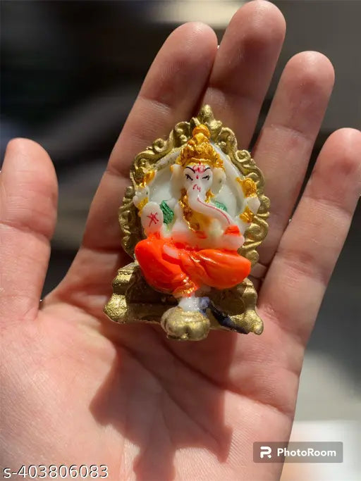 Polyresin Ganesha idol, handcrafted with gold accents, for home puja gifts or decor