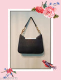 Stylish black slingbag handbag with silver zippers