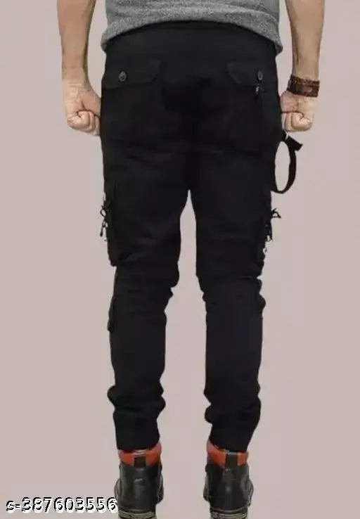 Black cotton blend cargo jeans by Flaying Men, size 6 on model, solid design for men's fashion