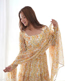 Yellow printed Anarkali kurti set with matching dupatta, heavy soft fox georgette zigzag print from Meesho, for Indian wedding Haldi ceremony