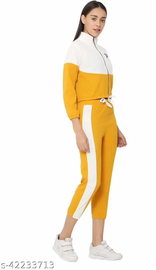 Classy glamorous women's colorblocked Lycra jumpsuit, long sleeves and net pattern. Size options: S-XL. Made in India