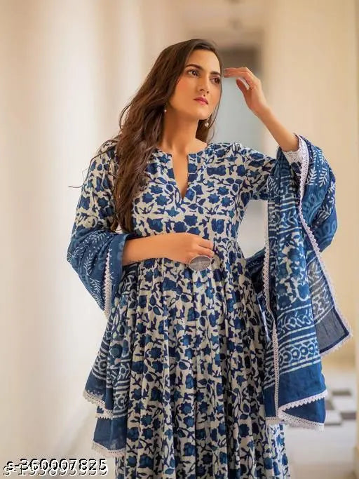 A woman in a blue anarkali with matching pants and dupatta