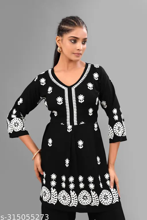 Black rayon printed women's top and palazzo set, embroidered with sequins work and net pattern. High-quality fabric for party, wedding, or casual wear