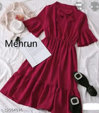 Red cotton midi dress with off-the-shoulder puffed sleeves, knee-length skirt, and black belted waist