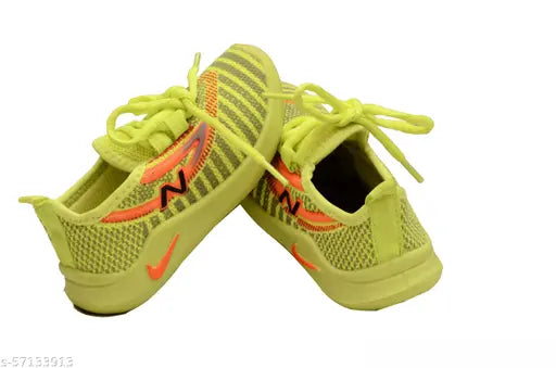 Green and yellow running shoes for kids
