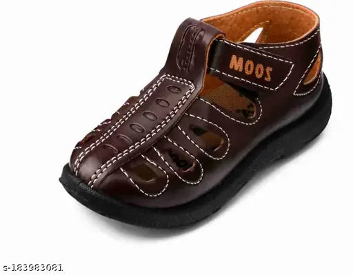Stylish brown leather sandal with 'MOOS' inscription, adjustable straps, padded footbed, suitable for casual wear and ideal for kids with wide variety of colors available
