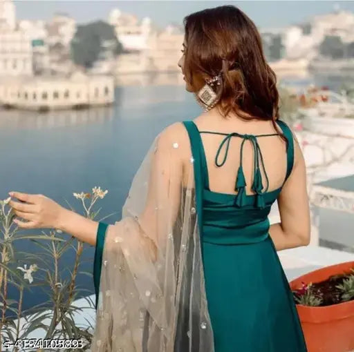 Art silk green women's gowns with dupatta set, cream color dupatta on display. Indian-made, available in multiple sizes (S-6XL)
