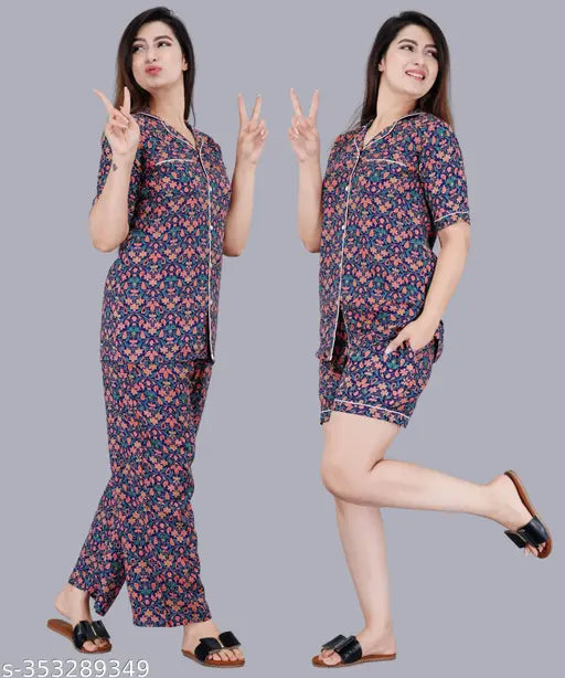 Blue rayon printed women's night suit combo set with short and shirt, featuring a stylish blue pattern