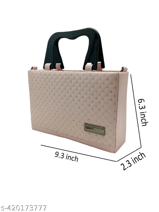 Ladies small beige quilted shoulder bag, black trim, top handle and long strap