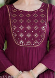 Rayon printed Anarkali gown for women and girls, embroidered three-quarter sleeve dress on mannequin