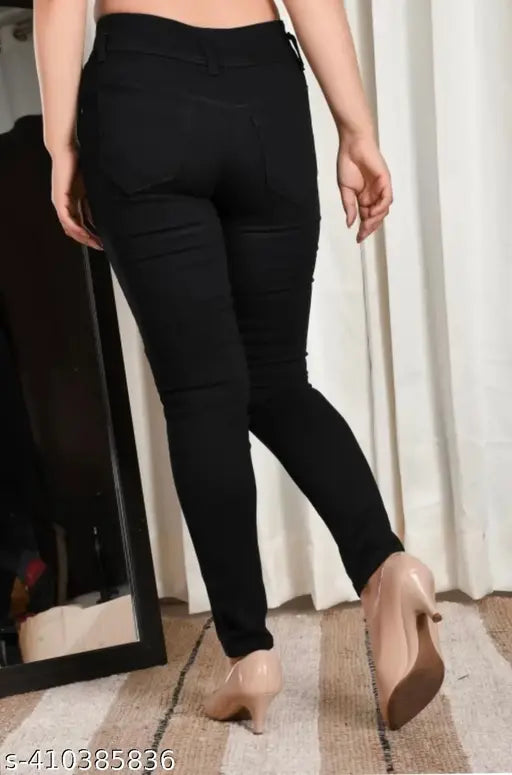 Black cotton blend stretchable jeans for women, high waist party wear, tie-ups net detailing, curved pockets, light faded wash