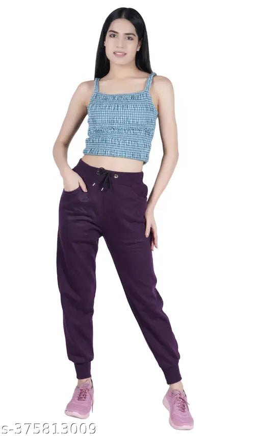 Purple track pants with a high waistband