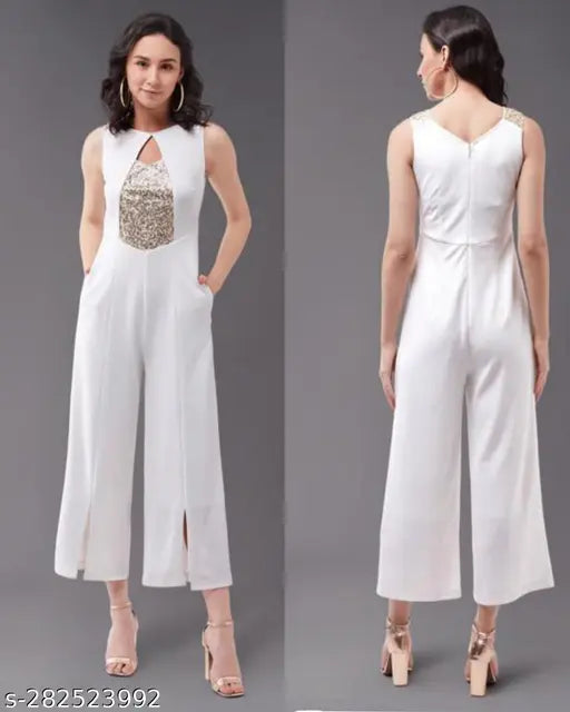 Trendy lycra sequin jumpsuit, embellished net, v-neck, sleeveless, zip closure, 2 pockets. XL size: 42 bust, 51 length, 36 waist. Indian cocktail party wear