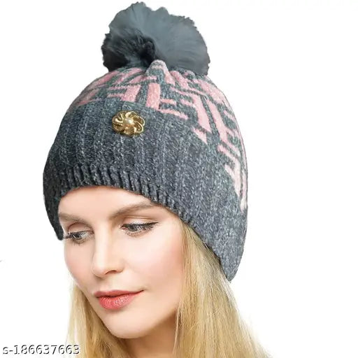 Modern, woolen knitted winter cap for girls or women. Soft fur inside a grey multi-design hat