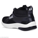Black and white boys' sports shoe with Nike swoosh logo