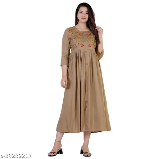 Beige rayon embroidered flared kurti with three-quarter sleeves, intricate Indian embroidery pattern
