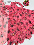 Dark peach color printed Georgette Anarkali gown with long sleeves, intricate multi-print design on display