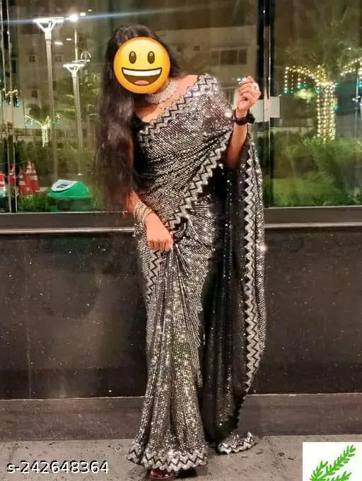 Georgette saree with sequined border, embellished work on body and pallu