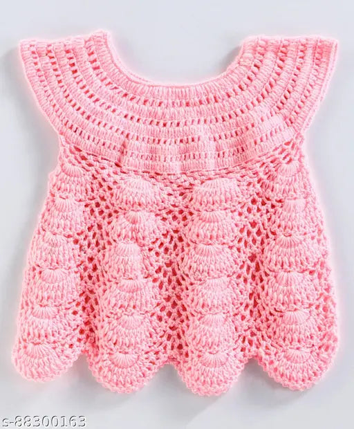 Handmade pink acrylic crochet baby frock with floral pattern, self-designed net, suitable for newborns to 3-4 years old. Made in India