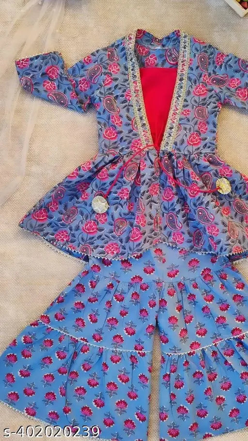 Bright, vibrant print Innersharara jacket style kurti set in comfortable cotton for young girls (size 13-14 years, bottom length 36 in). Traditional ethnic Indian wear with matching sharara and Gota lace detailing