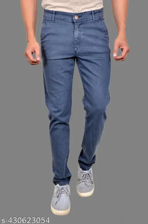 Dark blue denim jeans with distressed knee, cropped leg length