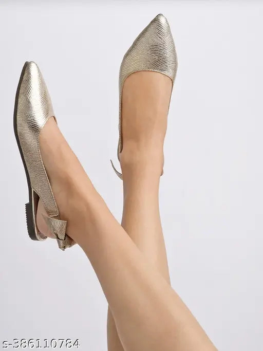 Synthetic ballerinas in golden bellies style for women - Shoetopia slip-on shoes on display stand, India origin