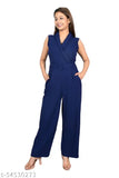 Blue polyester sleeveless jumpsuit for women, solid blue color on model standing