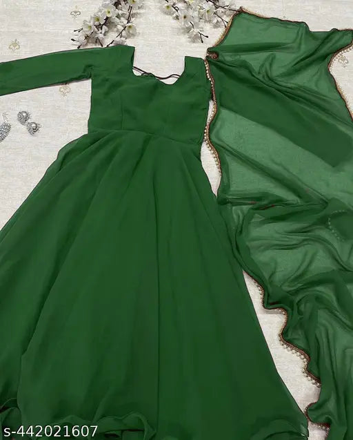 Green Georgette Stitched A-Line Dress - Luxurious, elegant, and perfect for special occasions. Intricate stitching details on vibrant green fabric. Sizes: S, M, XL. Made in India