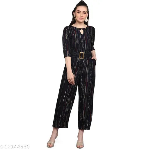 Woman in trendy colorblocked rayon jumpsuit with short sleeves and foil print, model wears size S (bust 34", length 52", waist 30", hip 36"). Rayon fashion jumpsuit from India