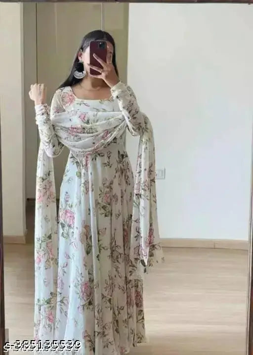 White cotton blend flower print gown with dupatta, three-quarter sleeves, featuring Indian print design. Size chart available for S, M, L, XL, XXL
