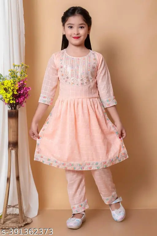 baby Naira Setss cotton blend girls dress, straight top with three-quarter sleeves, floor length salwar style. Indian girl's clothing for ages 2-10 years old on display