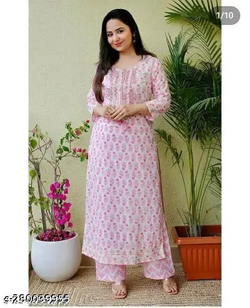 White embroidered printed Pink Kurta with white Pant, rayon fabric, casual style, round neck, three-quarter sleeves, and printed combo. Ideal for daily wear, parties, or festivals. Indian origin