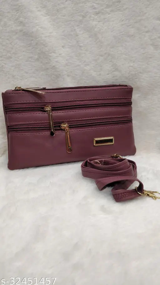 Purple leather slingbag, gold hardware, multi-pocket design