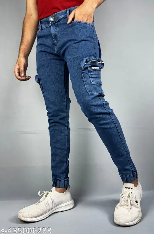 Dark blue denim jeans with distressed details, cropped cutoff style