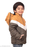 A boy wearing a tan, black and white puffy winter jacket