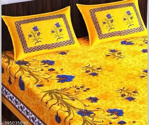 Yellow cotton double bed sheet with blue floral design and 2 pillowcases.