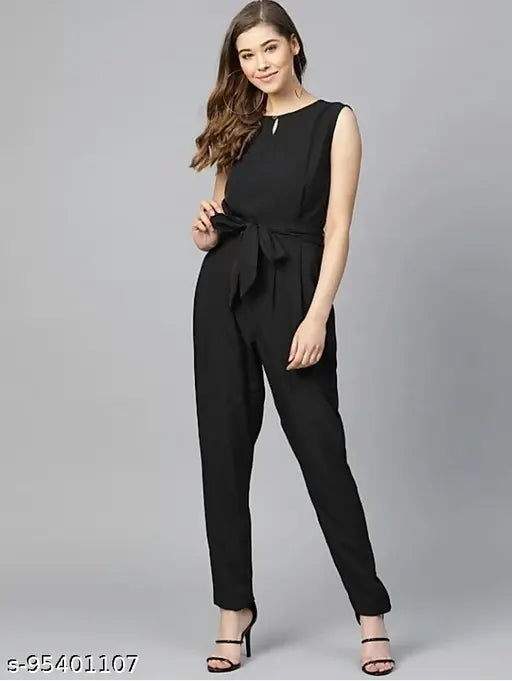 Black sleeveless jumpsuit for women, size L on model with accessories