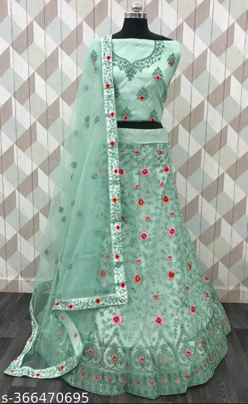 Sky blue embroidered net lehenga choli with semi-stitched blouse & 2.5m dupatta, adorned with golden zari work. Indo-western partywear, perfect for weddings and special occasions