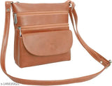 Tan leather shoulder bag with a crazy zipper and strap