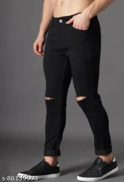 Stylish slim fit denim men's black knee-cut jeans, solid print, mid-rise, 5-pocket design from "Jac Fashion