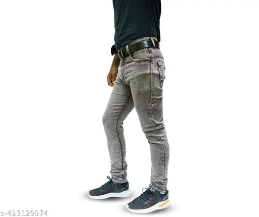 Black skinny jeans with a slight fade, zip fly and black belt loop, men's casual wear