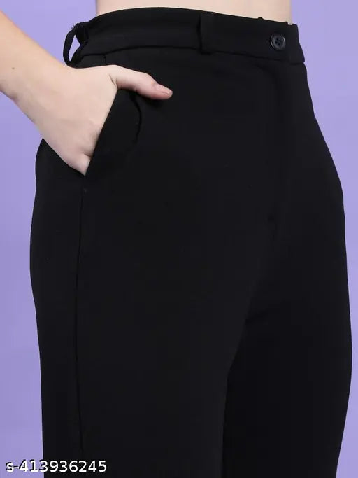 Black formal women's pants for office use. Fashionable design, slim fit