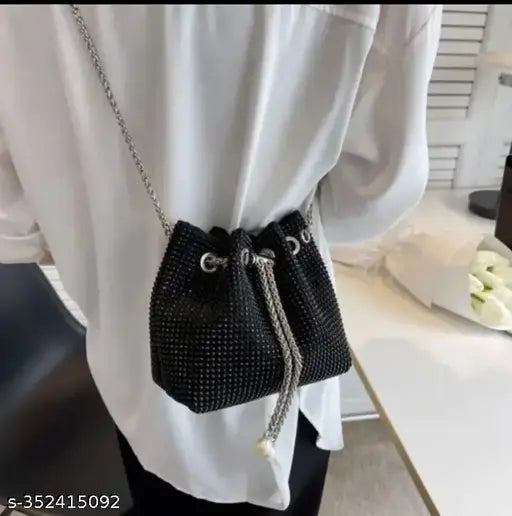 Black embellished leather shoulder bag with zip closure