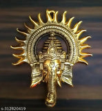Gold-toned Ganesh statue with Surya Kiran, used for Vastu decoration and prosperity in home office