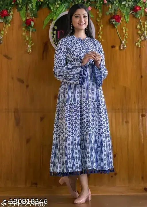 Viscose Anarkali kurti with pompom lace, long sleeves, vibrant printed design. Bohemian flair, Indian origin." (124 characters)