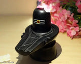 Handcrafted Black Resin Shivling Idol with Tilak design, 12cm tall, symbolizing Lord Shiva from India