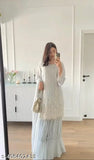 White embellished kameez with long skirt, fringe details